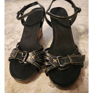 Black strappy sandals with cork wedge heel